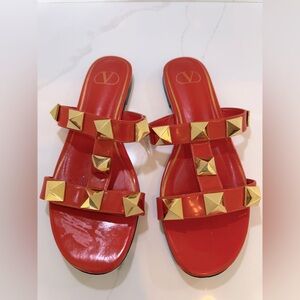 VALENTINO GARAVANI orange Roman Stud Slides. Size: Euro 37
